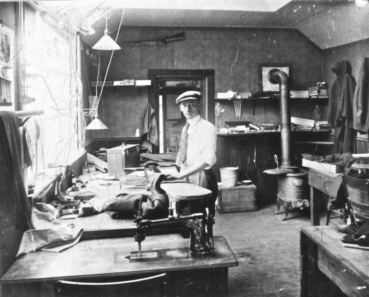 Black and white picture of old tailor