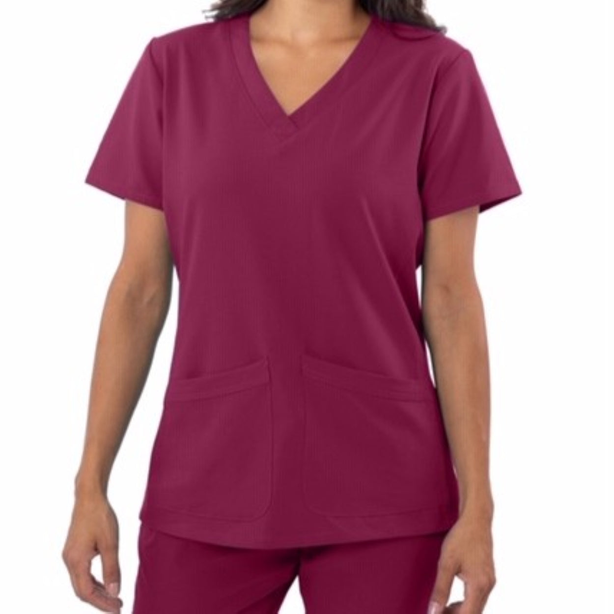 Wine burgundy scrub top on a white background