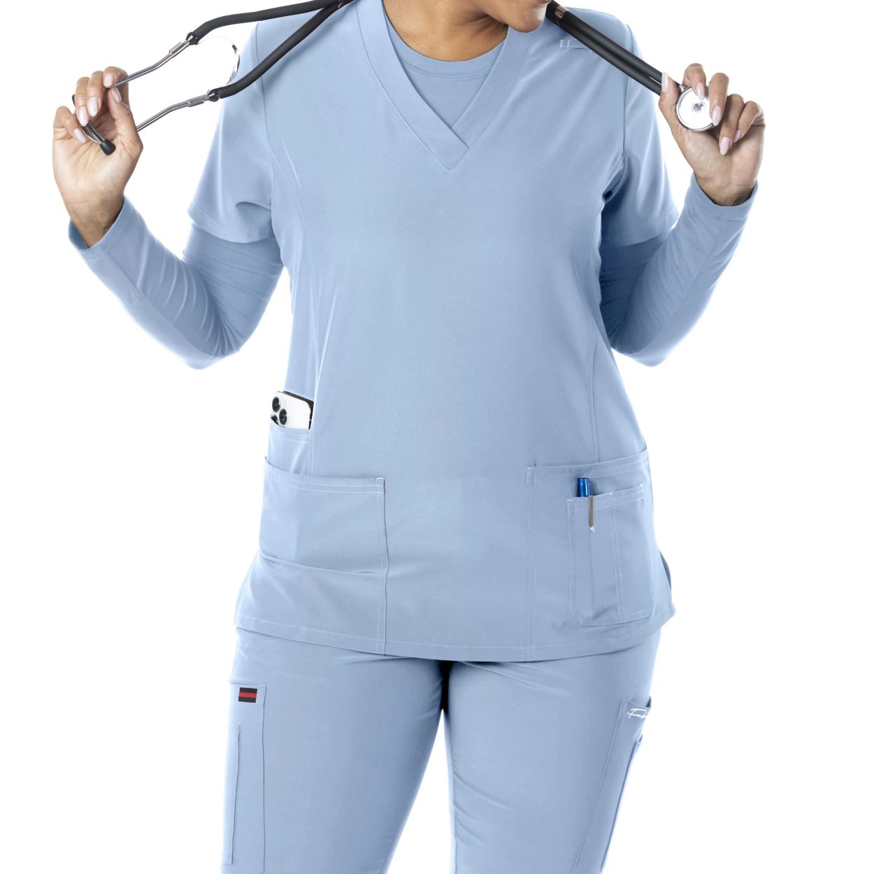 Della Robbia blue scrub top on a white background