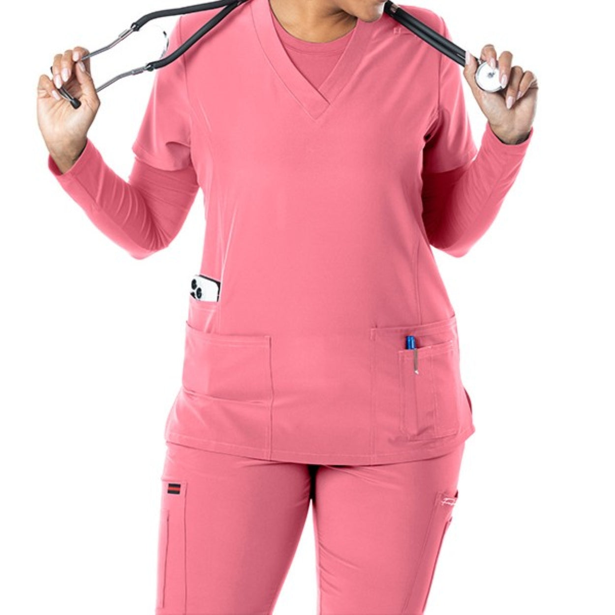 Dusty rose scrub top on a white background