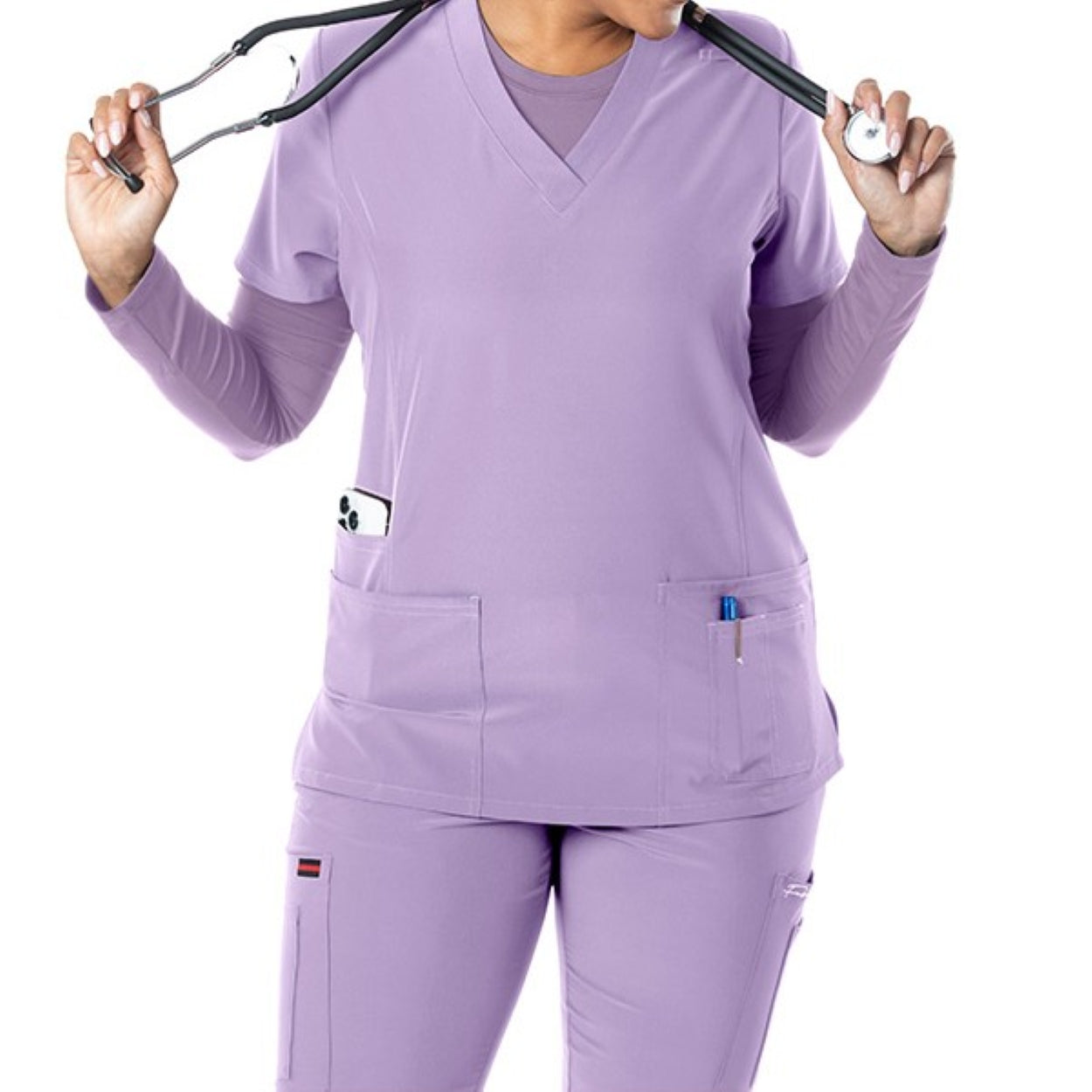 Lavender scrub top on a white background