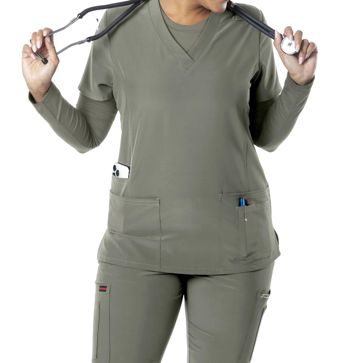 Tea leaf green scrub top on a white background