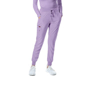 Lavender scrub pants on a white background