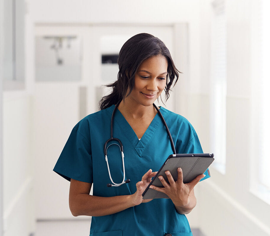 Female in medical scrub working