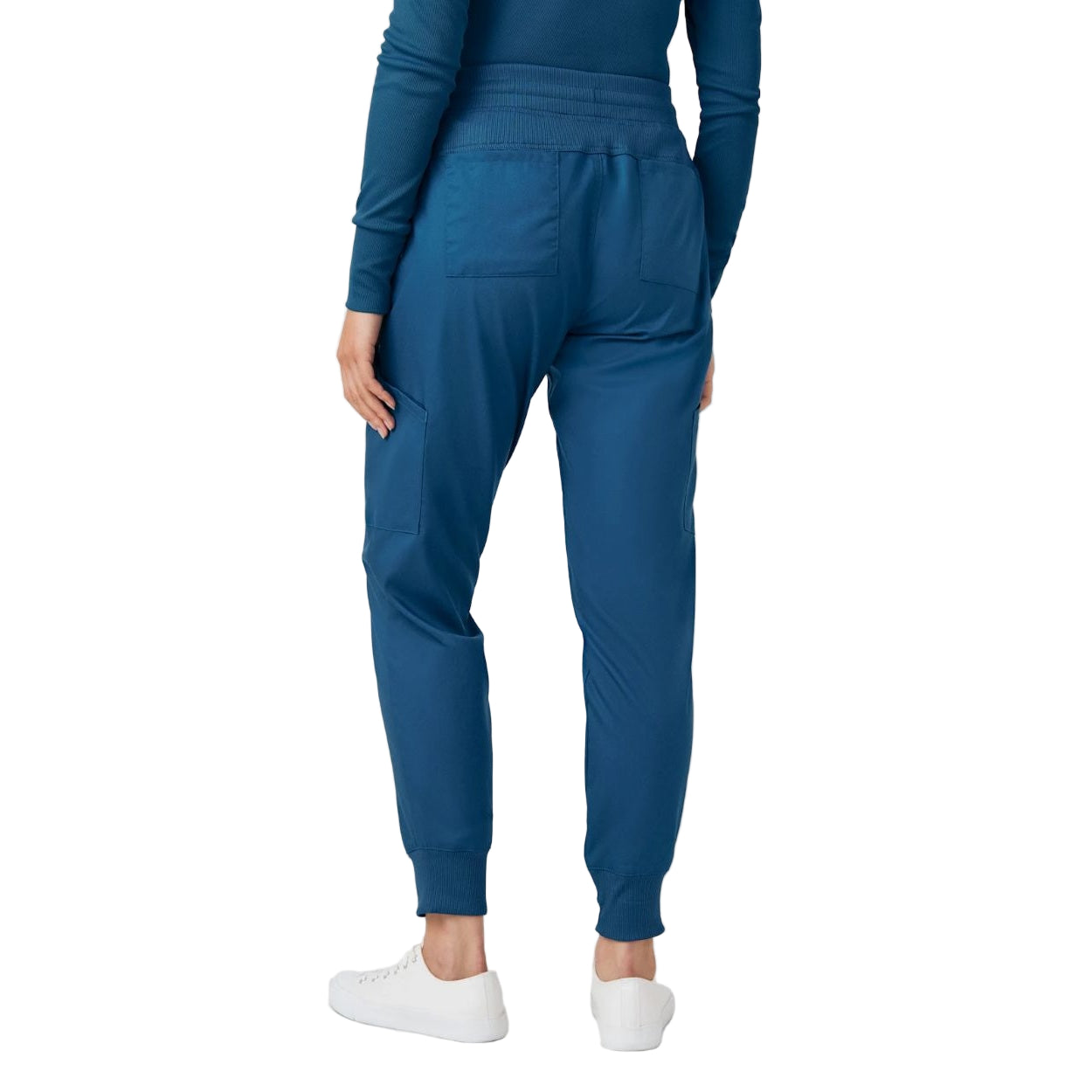 Caribbean blue scrub pants on a white background