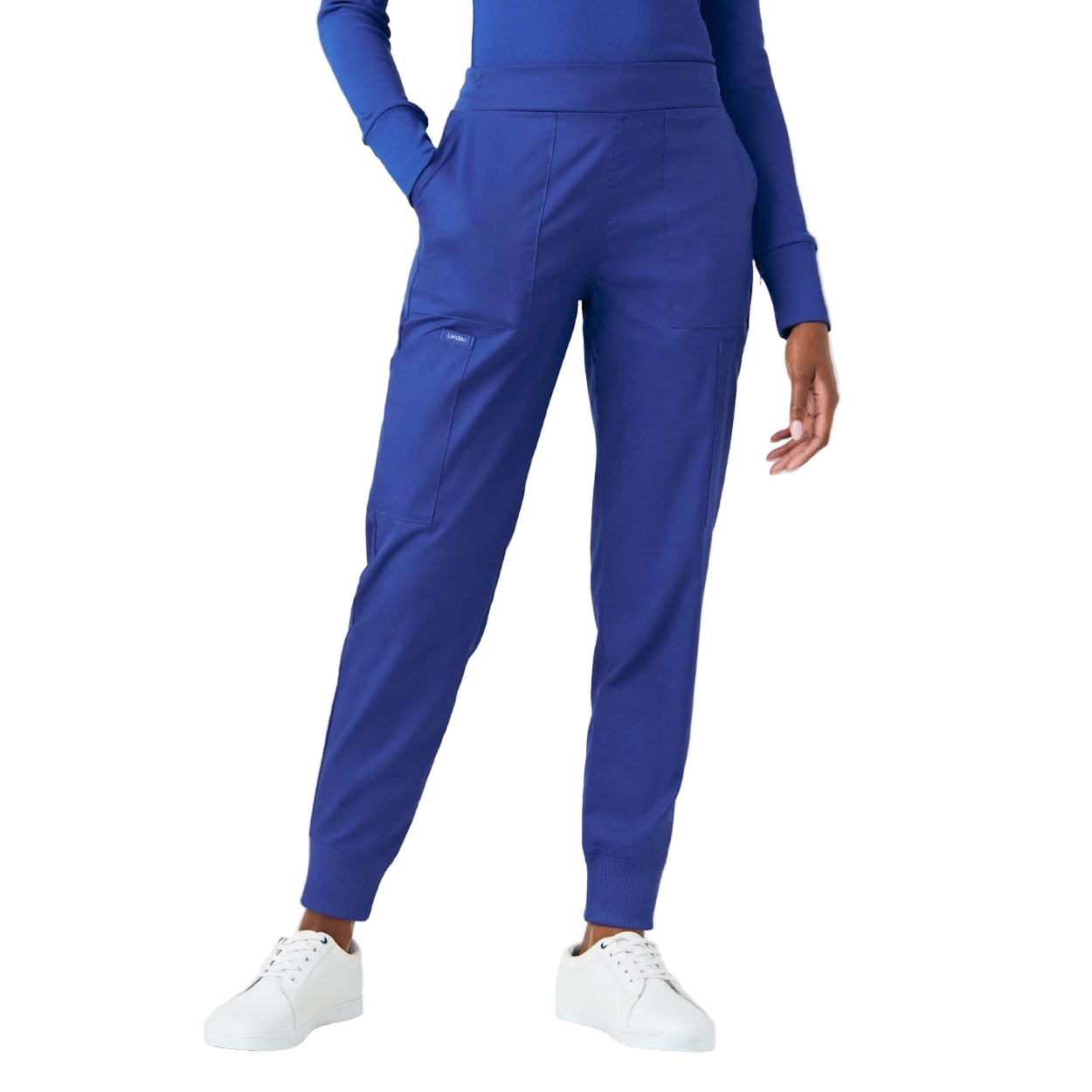 Galaxy blue scrub pants on a white background