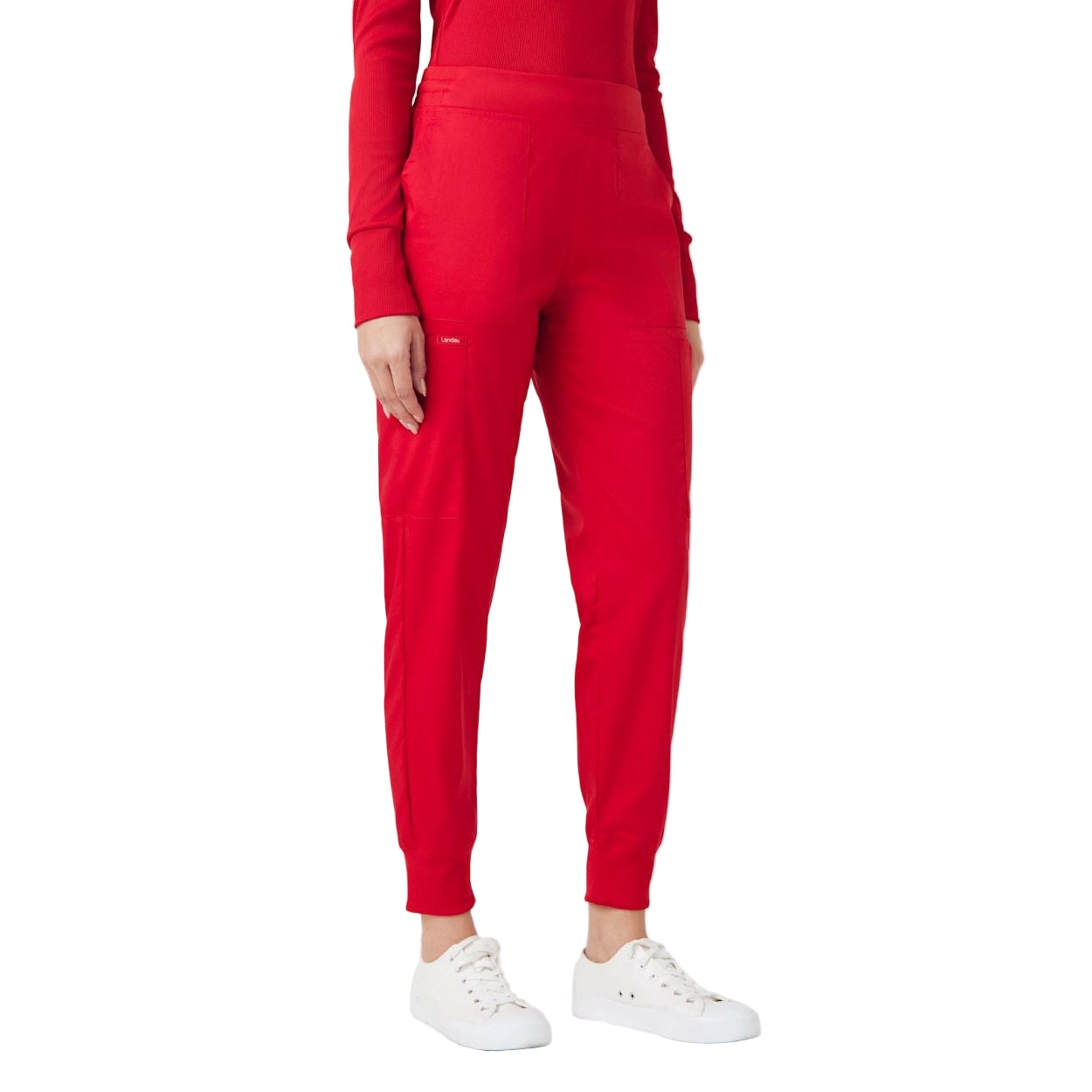 True red scrub pants on a white background