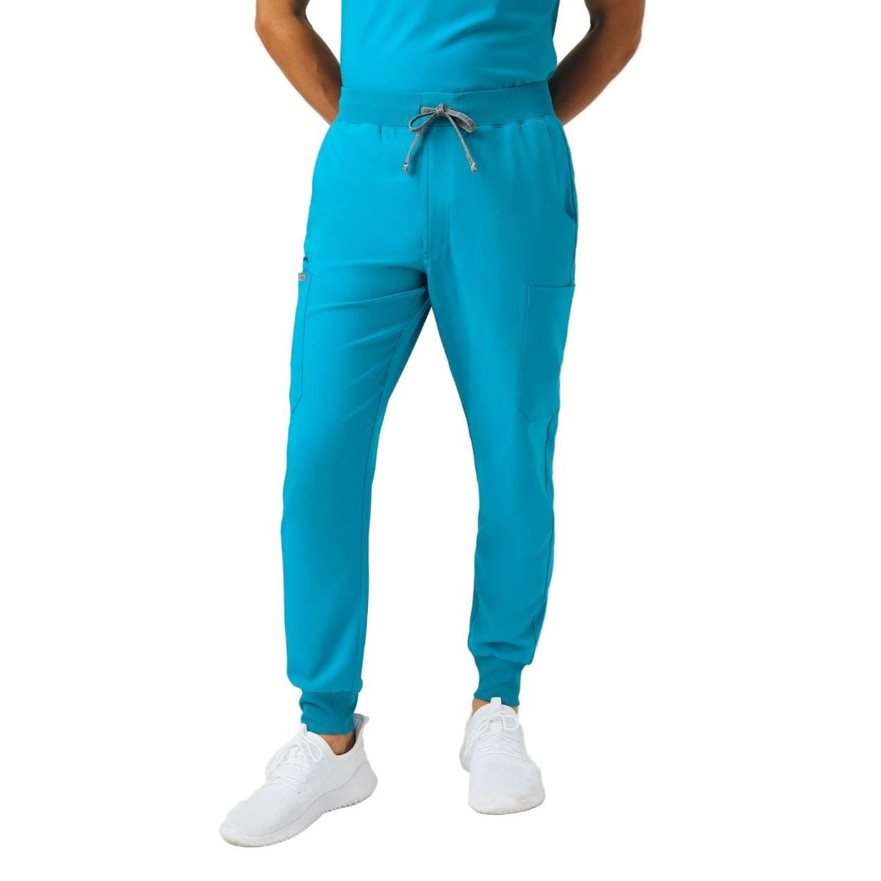 Teal scrub pants on a white background