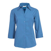 Mid blue shirt on a white background
