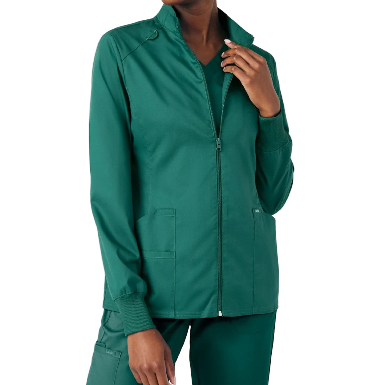 Hunter green scrub jacket on a white background