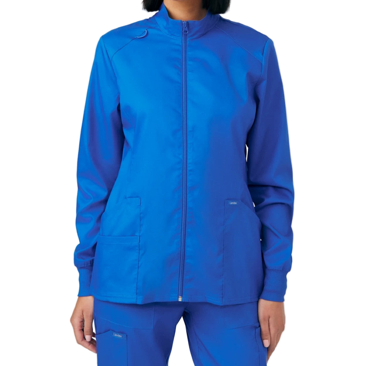 Royal blue scrub jacket on a white background