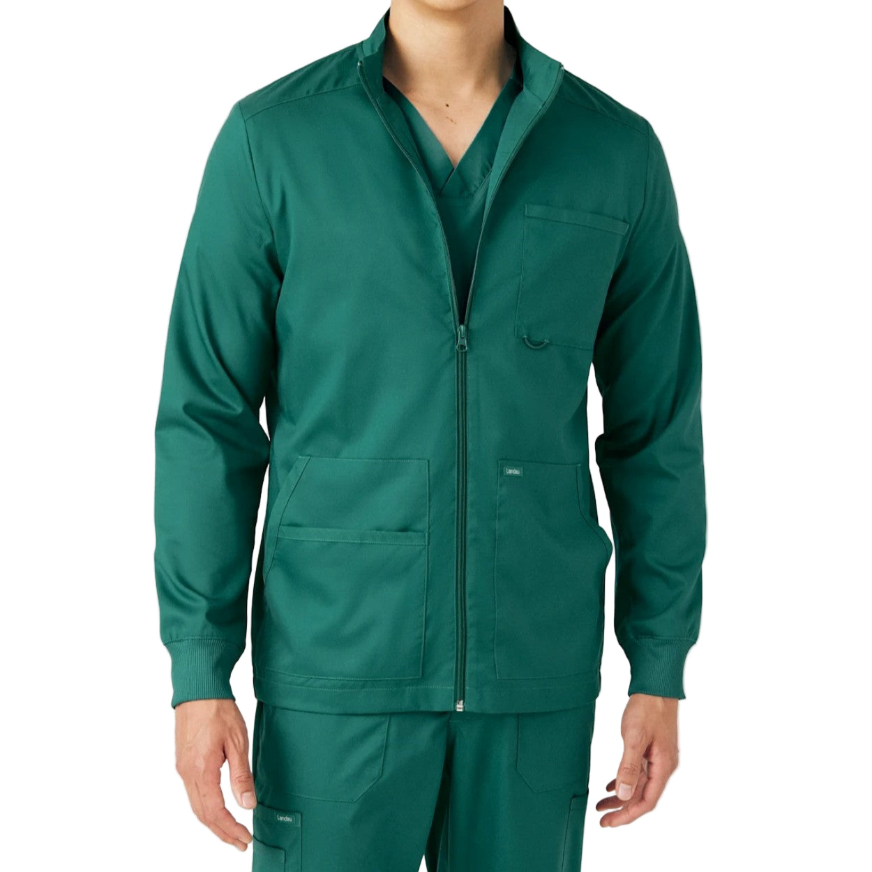 Hunter green scrub jacket on a white background