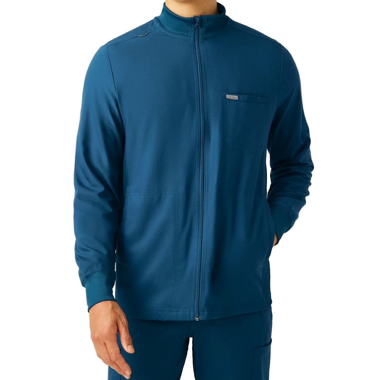 Caribbean blue scrub jacket on a white background