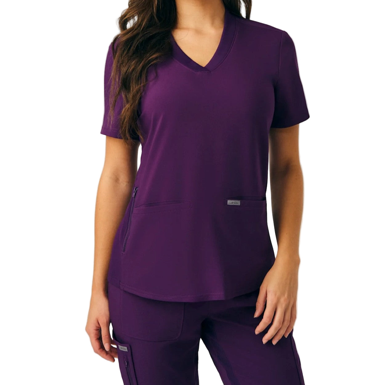 Eggplant scrub top on a white background