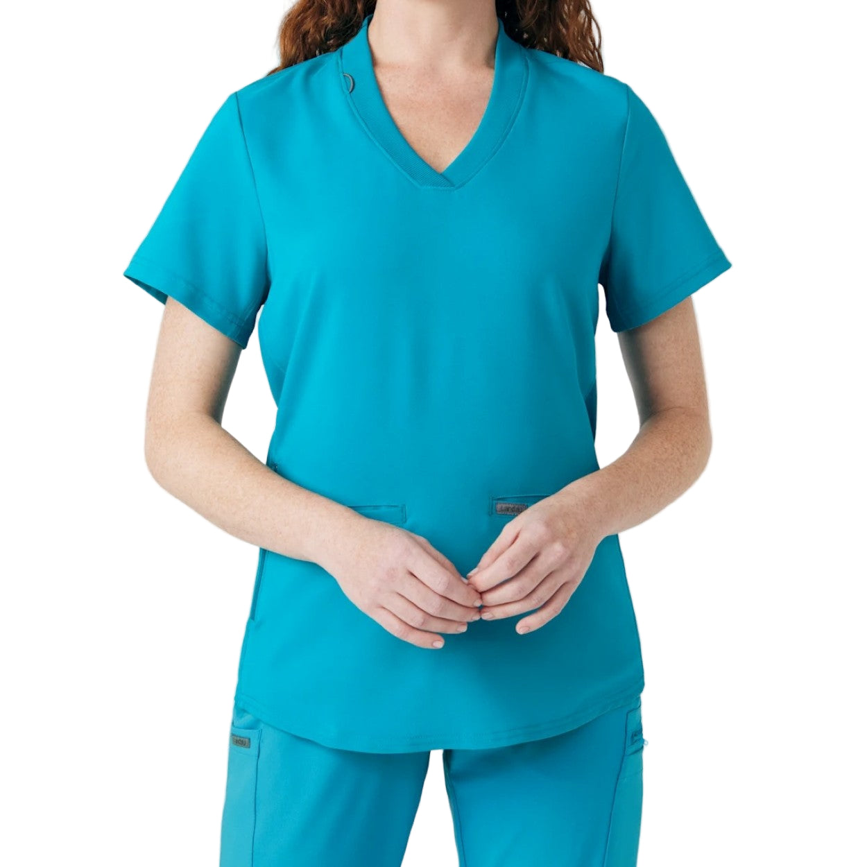 Teal scrub top on a white background