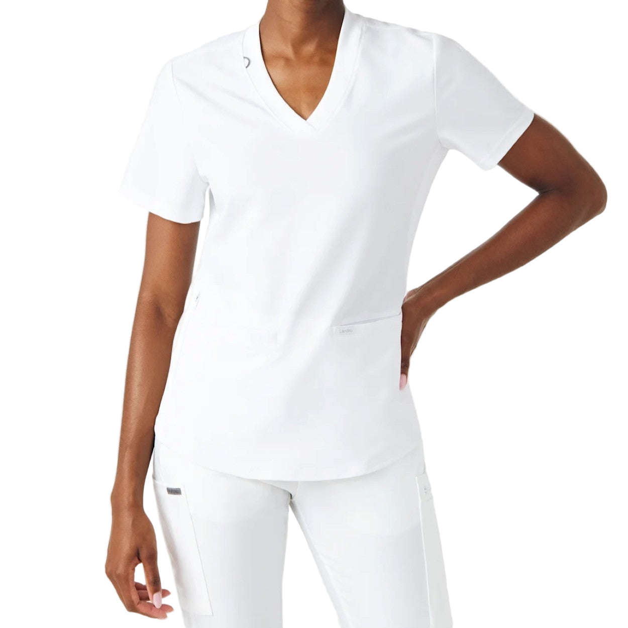 White scrub top on a white background