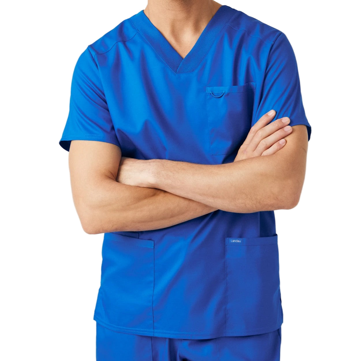 Royal blue scrub top on a white background
