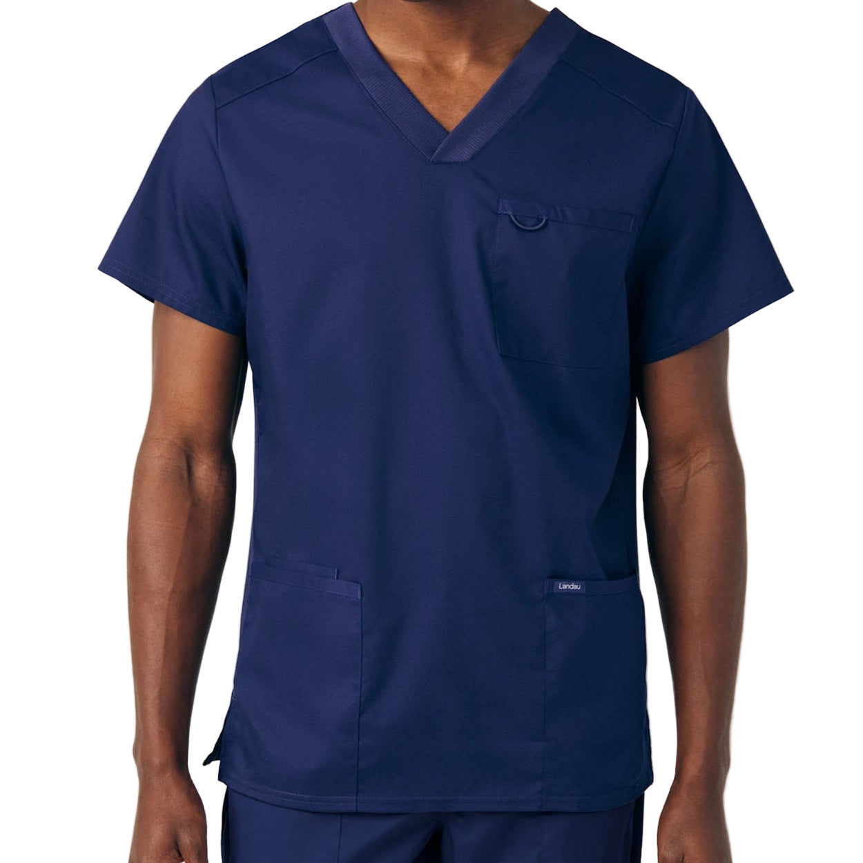 True navy scrub top on a white background